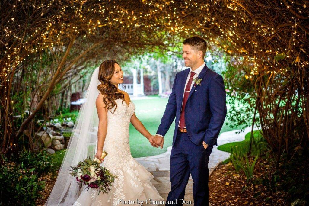 Couple under the garden arch