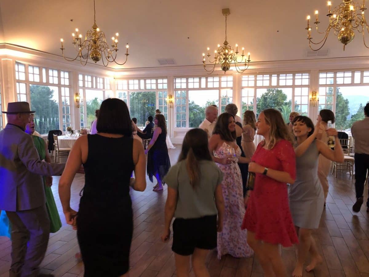 Guests of all ages enjoying the dance floor at Carmel Mountain Ranch Estate